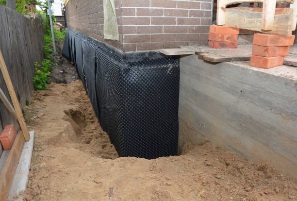 Happy homeowners after waterproofing job in Vicksburg
